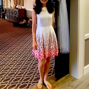 White fit and flare dress with pink flowers